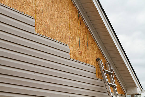 Professional Storm Damage Siding Repair technician working in Pendleton, OR